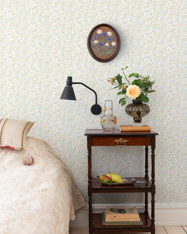 Colorful floral wallpaper with a white background in a bedroom