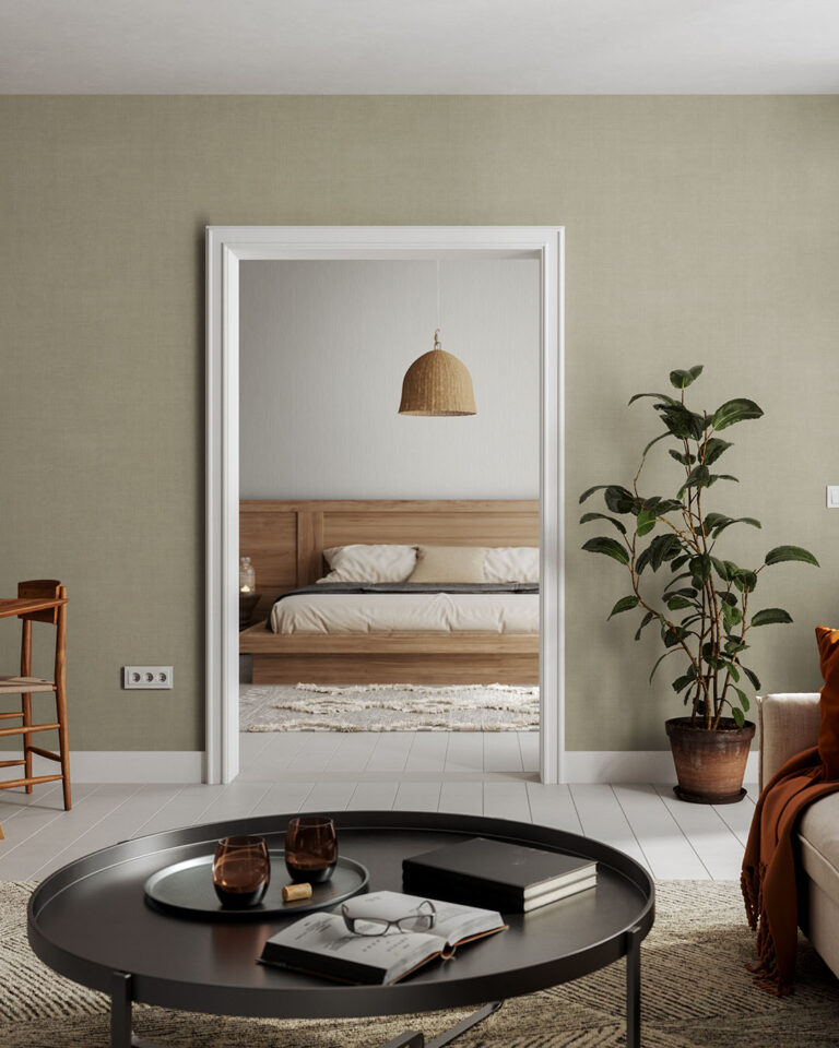 A cozy living room with solid-color wallpaper in beige and gray