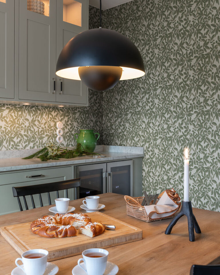 cozy kitchen with a table set for coffee and snacks