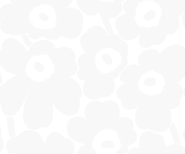 White wallpaper with a floral, retro pattern