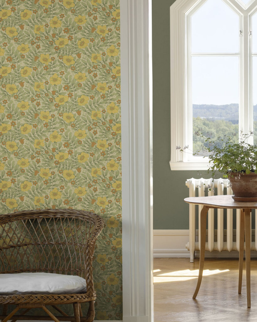 Yellow and green floral wallpaper in a bright, open hallway