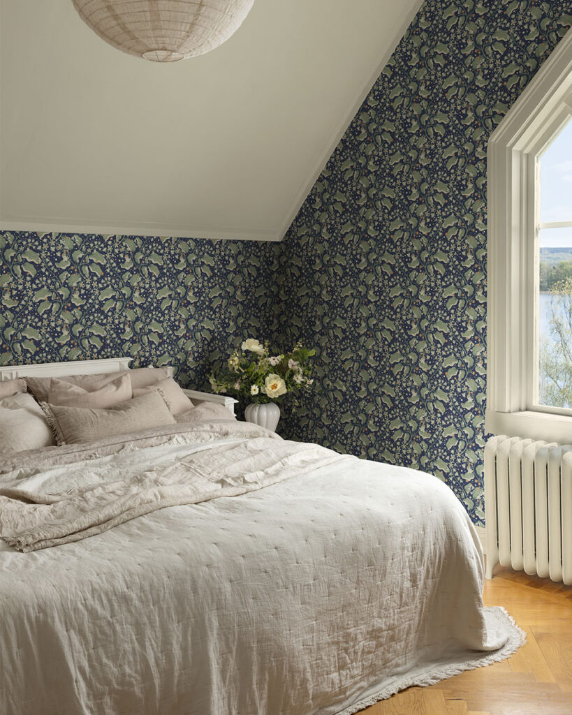 Cozy bedroom with blue lilac wallpaper