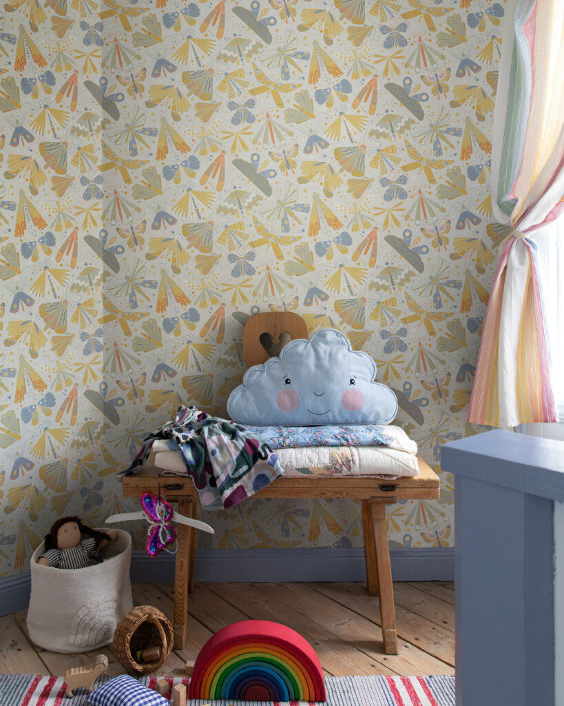 A colorful and playful children's room with light blue decor and accents