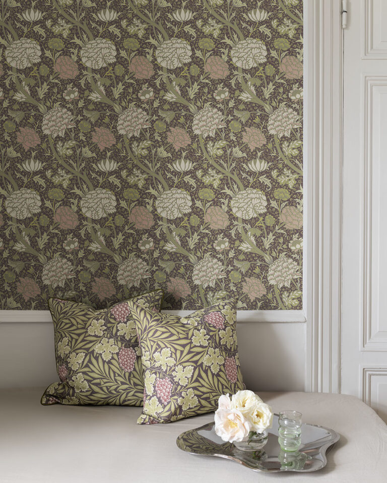 Wallpaper featuring winding flower vines in green, muted purple, and pink in the children's room
