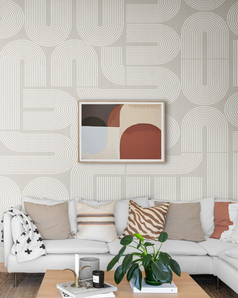 Bright living room with light-colored wallpaper featuring an abstract pattern